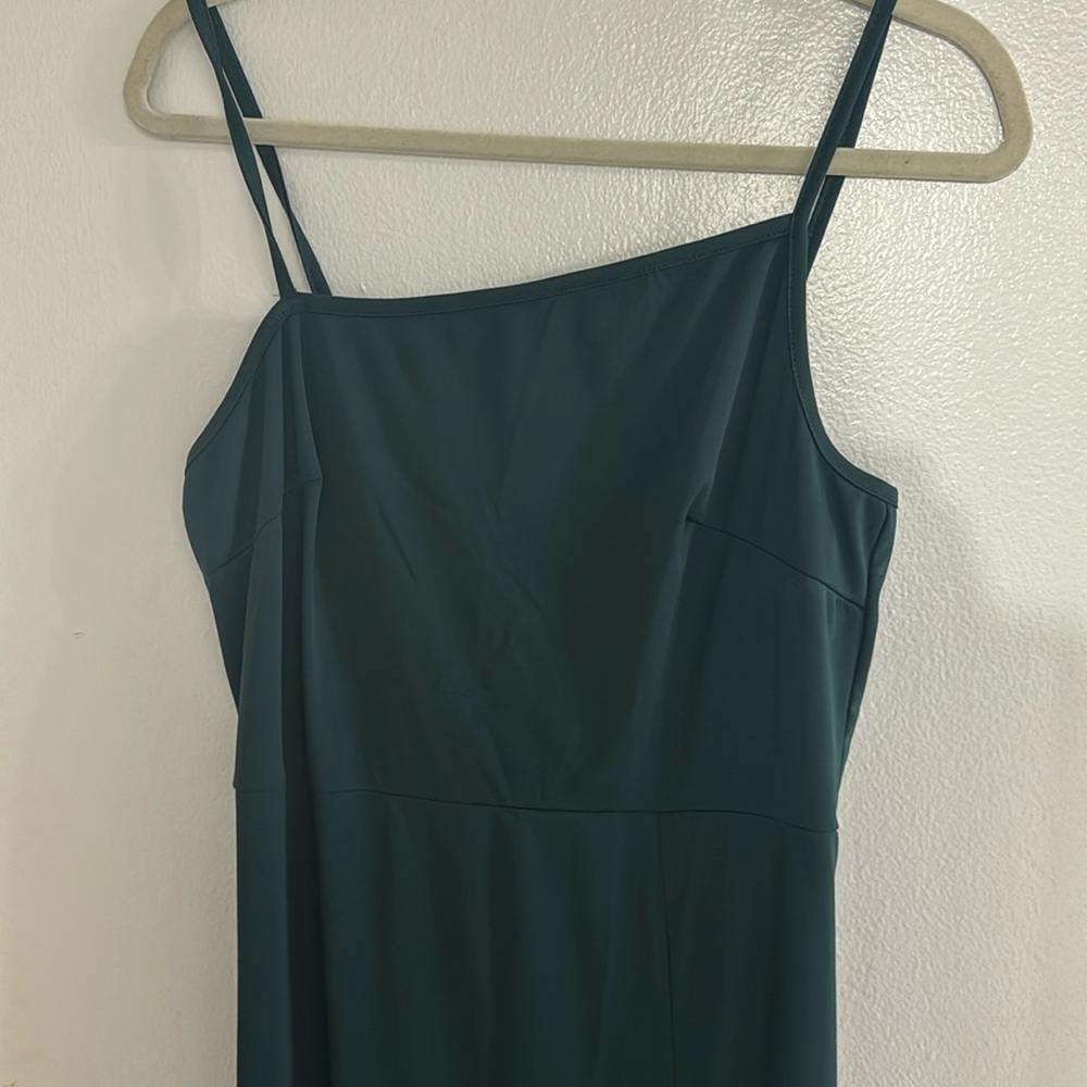 Green asymmetrical midi dress with slit